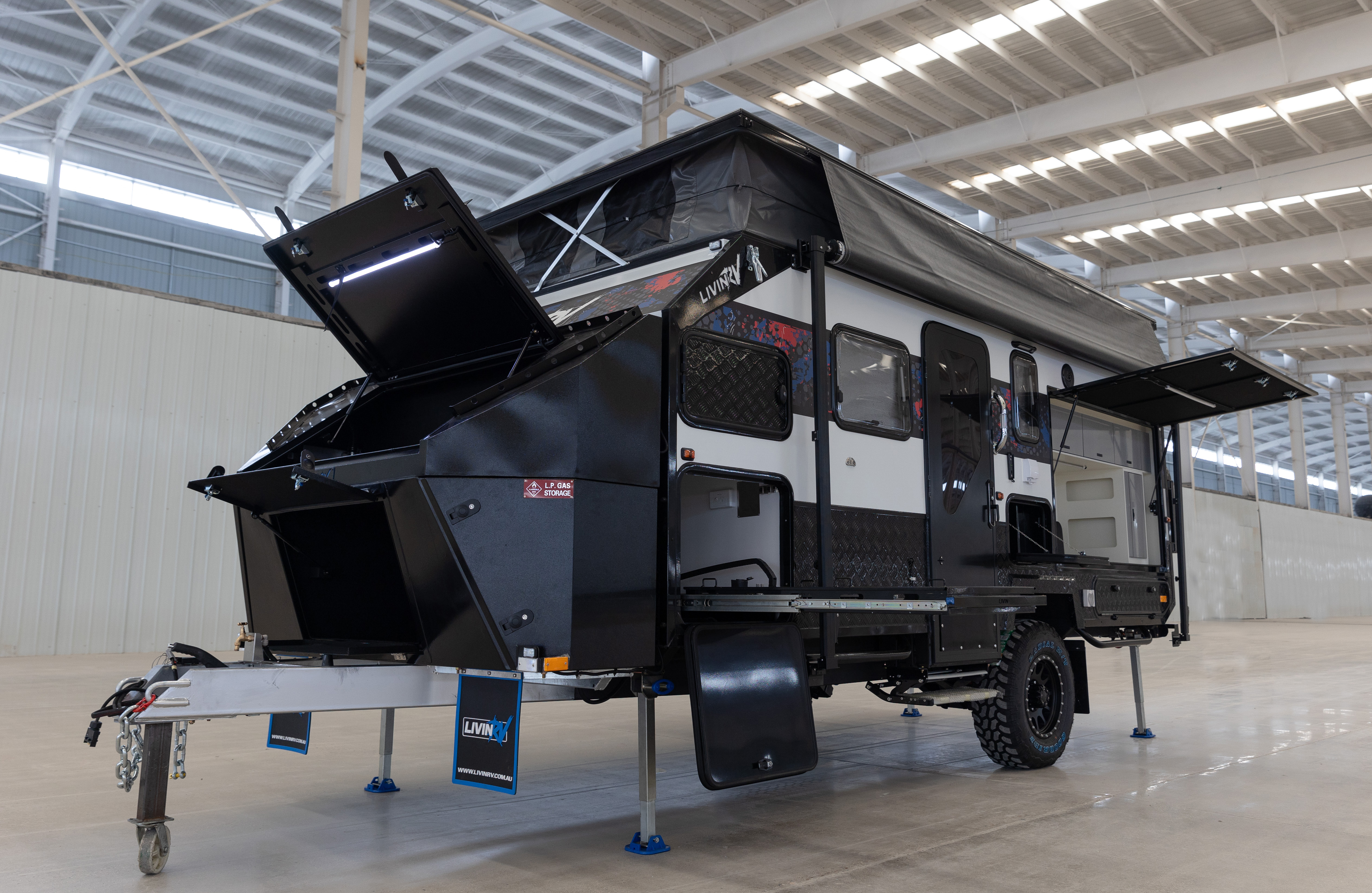 The Legacy 16s a side folding hybrid off-road caravan